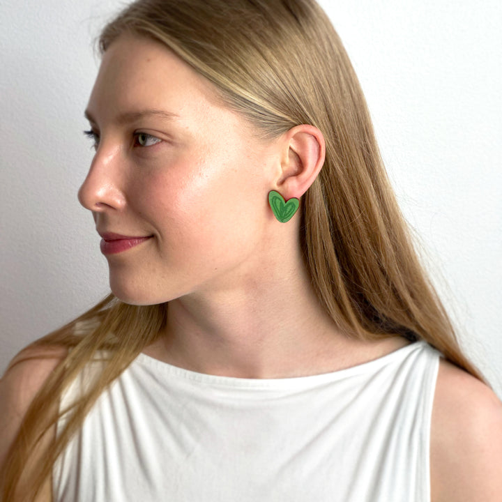 Button earrings | HERTTA | green
